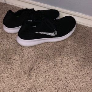 Black Nike running shoes